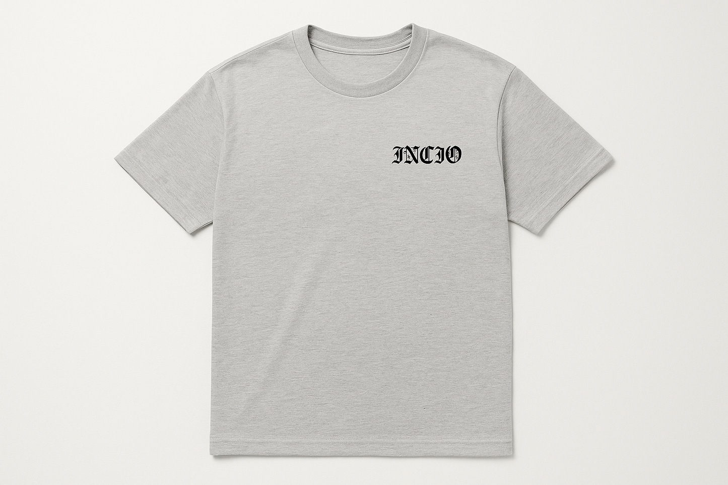 Light grey t-shirt with black INICIO logo - flat lay
