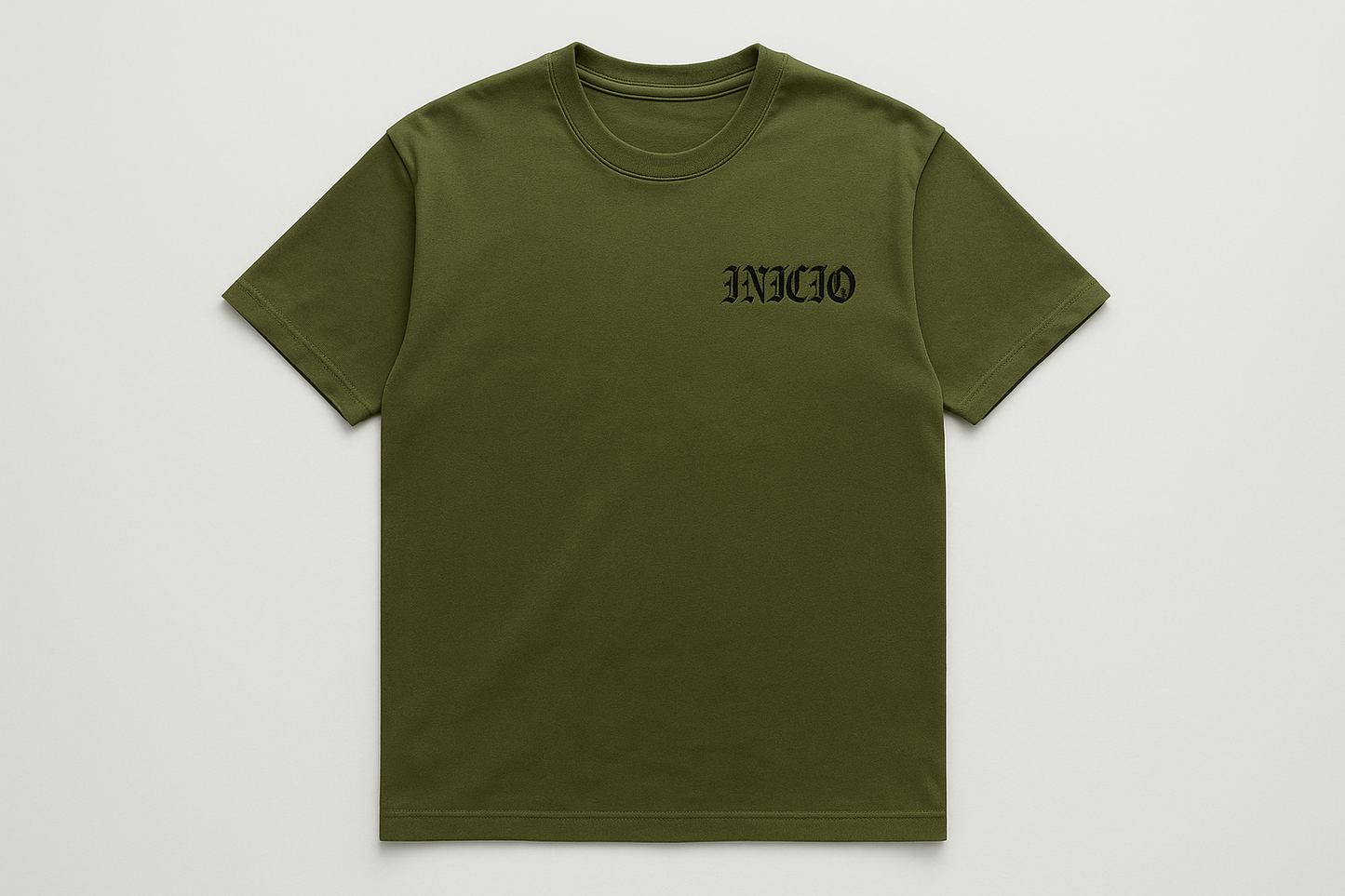 Olive green t-shirt with black INICIO logo - flat lay